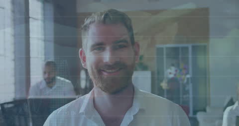 Smiling Professional in Modern Office with Financial Data Overlay