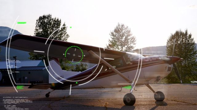 This video depicting a high-tech surveillance scanner targeting a small private plane can be used to illustrate concepts relating to advanced aviation technology, security measures in airports, or futuristic digital interfaces. Perfect for websites, marketing materials, and articles focused on innovation in the aviation industry, advancements in global communication, or travel security.