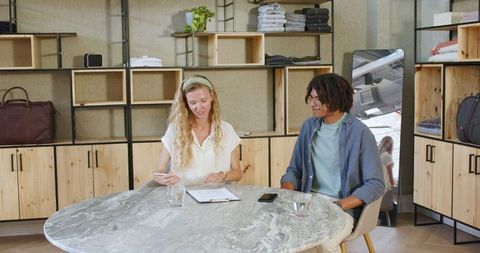 Colleagues Discussing Business Strategy at Modern Office Table