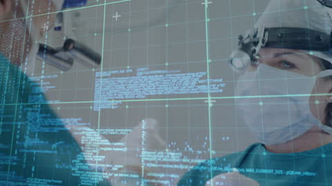 Surgeons Analyzing Data in High-Tech Operating Room