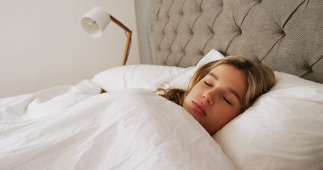 Peaceful Young Woman Sleeping Comfortably in Home Bedroom - Download Free Stock Images Pikwizard.com