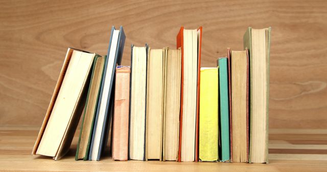 Books Standing in a Horizontal Line on Wooden Shelf - Download Free Stock Images Pikwizard.com
