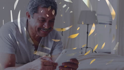 Senior Man Engaged with Tablet and Abstract Digital Art