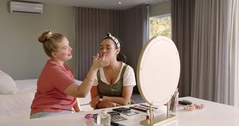 Women Enjoying Makeup Session at Home Vanity Space