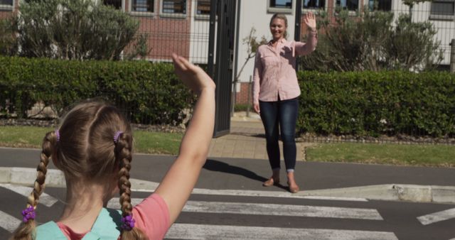 Mother Waving Goodbye to Daughter on First Day of School - Download Free Stock Images Pikwizard.com