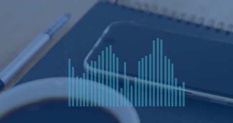 Animated Digital Graph Over Office Desk Items