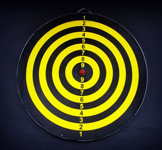 Yellow and Black Target Bullseye on Dark Background - Download Free Stock Images Pikwizard.com