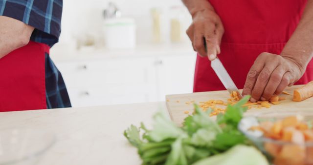 Couple Chopping Vegetables Together in Kitchen - Download Free Stock Images Pikwizard.com