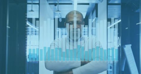 Confident businessman with financial data overlay in modern office