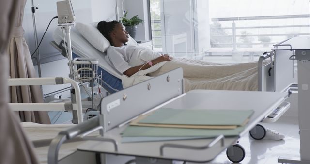 Female Patient Resting in Hospital Bed in Modern Medical Facility - Download Free Stock Images Pikwizard.com