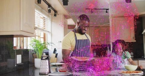 Father and daughter baking pizza together in bright home kitchen, family cooking fun