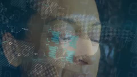 Woman Engaging in Futuristic Business Analysis with Digital Graphics