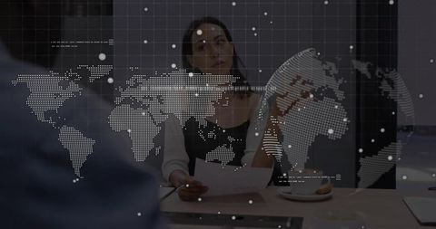 Confident Businesswoman Analyzing Data with World Map Overlay