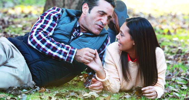 Happy Couple Relaxing on Fall Day in Park - Download Free Stock Images Pikwizard.com