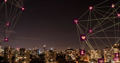 Digital Connections Overlay on Cityscape at Night