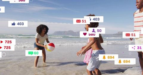 Family playing on sunny beach with social media notifications overlay and beach ball fun