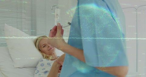 Nurse adjusting iv for patient in medical facility