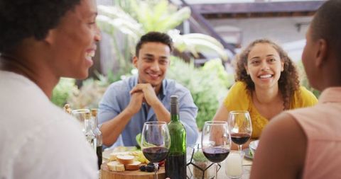 Diverse Friends Enjoying Wine at Outdoor Dinner Party - Download Free Stock Images Pikwizard.com