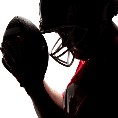 Transparent american football player silhouetted holding ball