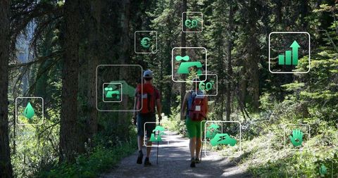 Hikers exploring forest trail with sustainability icons