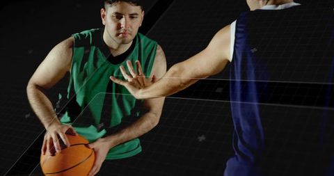 Intense basketball game with agile player dribbling