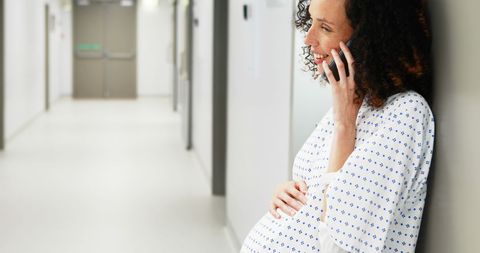 Pregnant Woman in Hospital Smiling During Phone Call - Download Free Stock Images Pikwizard.com