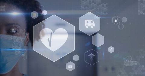 Clinician wearing mask monitoring vitals with futuristic hexagonal medical interface