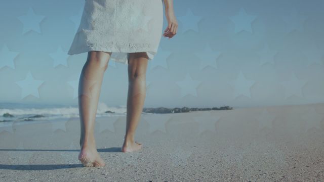 Woman's feet walking on sandy beach with animation overlay of stars. Generating a calm, holiday, and relaxing atmosphere. Perfect for travel promotions, summer vacation advertisements, and holiday-themed digital content.