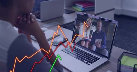 Woman watching laptop during remote collaboration with neon data graphs and analytics overlay