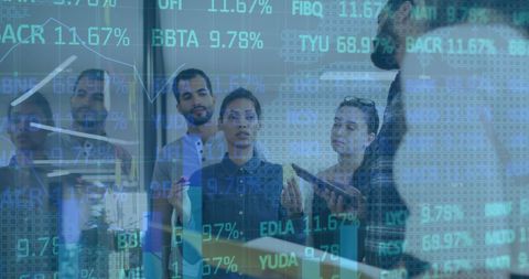 Diverse Business Team Analyzing Financial Data with Advanced Technology