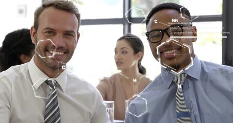 Colleagues smiling during meeting with molecular data overlays and teamwork visualization