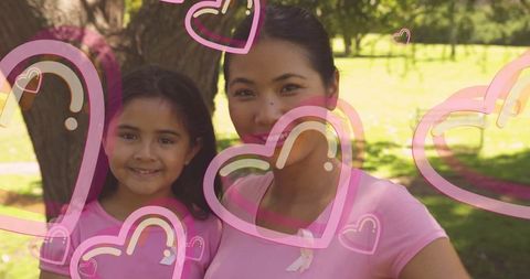 Mother and Daughter Together in Park with Ribbon Pins and Heart Graphics