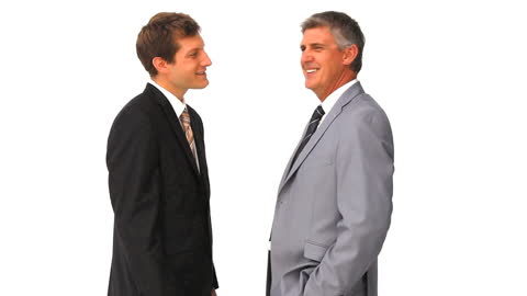 Two Smiling Businessmen Having a Discussion