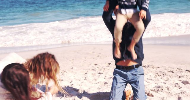 Family enjoying fun day at beach - Download Free Stock Images Pikwizard.com