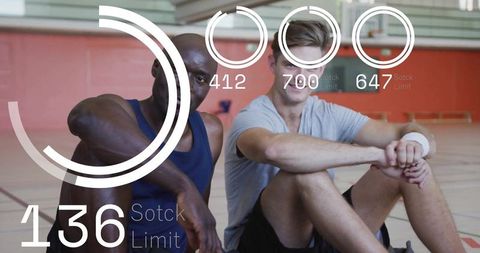 Athletes resting on basketball court with futuristic ui overlay