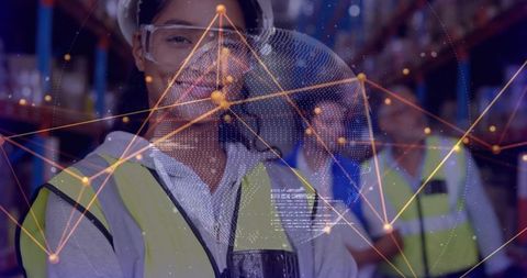 Worker utilizing smart technology in modern warehouse