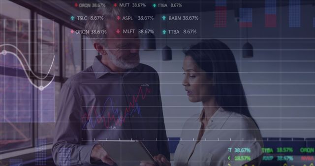 Finance Professionals Analyzing Stock Market Data on Digital Tablet in Office - Download Free Stock Images Pikwizard.com