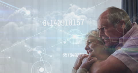 Senior Couple Amid Digital Data and Connectivity