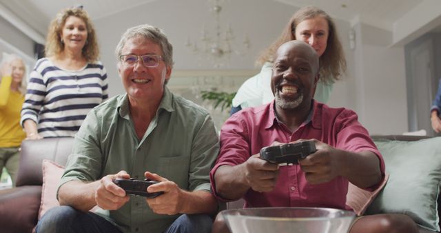 Image of happy diverse male senior friends playing image games - Download Free Stock Photos Pikwizard.com