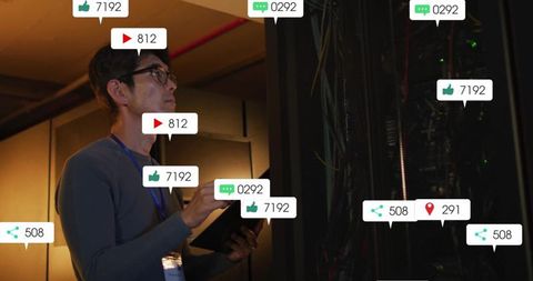 IT Engineer Evaluating Data Center Server Rack Efficiency