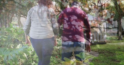 Senior Couple Embracing Nature, Reflects Quiet Devotion