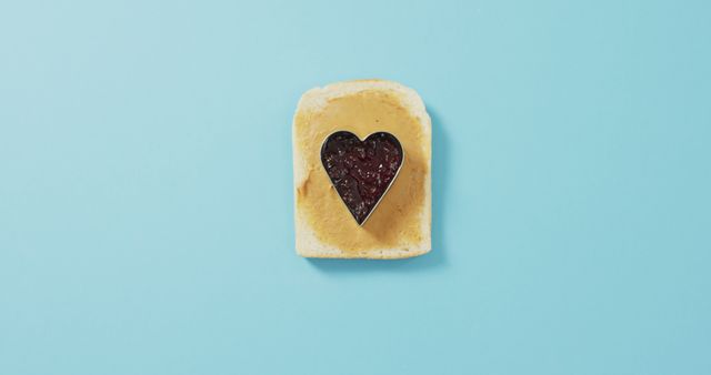 Heart-shaped Jam on Peanut Butter Toast on Light Blue Background - Download Free Stock Images Pikwizard.com