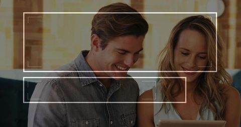 Smiling Couple Enjoying Technology Time Together