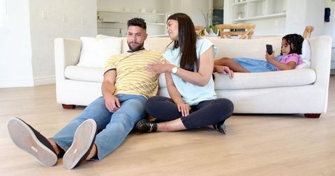 Family Time in Minimalist Living Room with Modern Decor and Casual Vibes