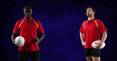 Diverse Rugby Players Posing with Rugby Balls