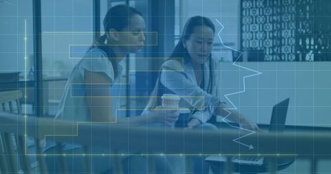 Business Team Discussing Financial Data Analysis in Modern Office