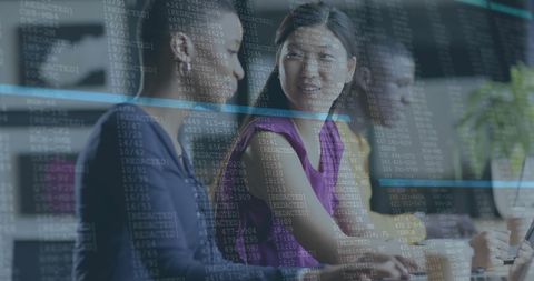 Collaborative Team Analyzing Data in Modern Office