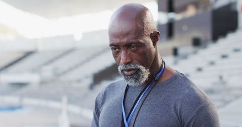 Confident African American Coach at Sports Stadium - Download Free Stock Images Pikwizard.com