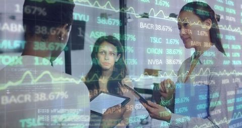 Businesswomen Analyzing Financial Data with Digital Impact