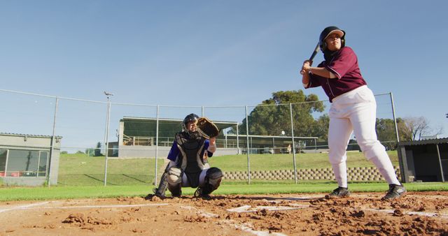 Female Baseball Player and Catcher in Intense Game Scene - Download Free Stock Images Pikwizard.com